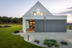 A beautiful house with a big green lawn
